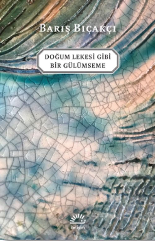 Doğum Lekesi Gibi Bir Gülümseme